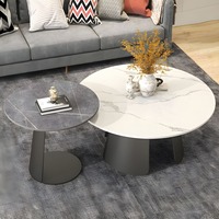 Ensemble de table basse moderne et durable avec un design gain de place, finition noire, cadre en acier et plateau en marbre