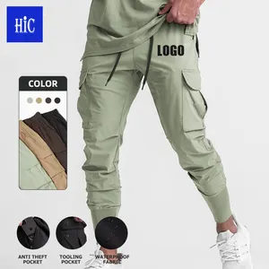 HIC оптовая продажа, высококачественные мужские брюки-карго с несколькими карманами, леггинсы для фитнеса с карманами, повседневные однотонные брюки-карандаш для бега