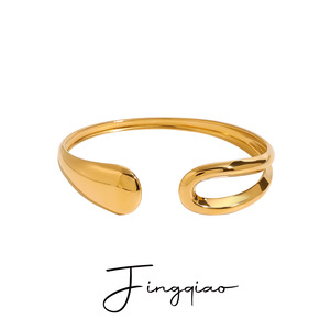 Bracelet manchette unisexe Yueli en acier inoxydable doré, design minimaliste et irrégulier, bijou de mode - Product Image 1
