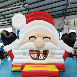 Castillo inflable comercial de Santa Claus con tobogán para niños, ideal para fiestas al aire libre. - Product Image 1