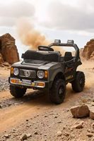 Voiture électrique tout-terrain pour enfants à quatre roues avec fonction bascule et volant télécommandé