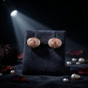 Boucles d'oreilles ovales en or rose pour femmes, motif en spirale, zircone cubique incrustée, clous d'oreilles géométriques, bijoux de mode pour tous les jours et les fêtes - Product Image 1