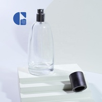 Bouteille de parfum vaporisateur en verre vide rechargeable de luxe de marque privée personnalisée de 100ml avec bouchon