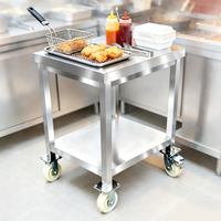 Banc de travail mobile robuste à 2 niveaux en acier inoxydable avec roulettes pour la préparation en cuisine commerciale et autres fournitures hôtelières et de restauration