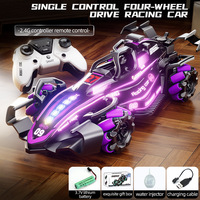 Voiture RC de cascade 360° avec double commande, véhicule de course 4x4 à dérive, doté de lumières LED, de musique et de jets simulés pour un jeu amusant