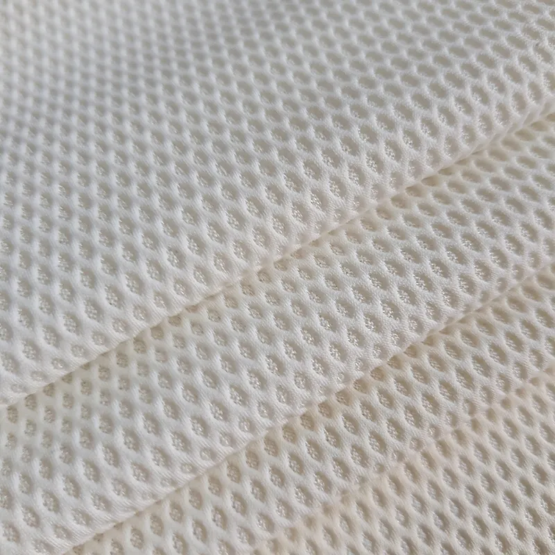 In stock four sided elastic breathable circular hole polyester nylon spandex mesh fabric