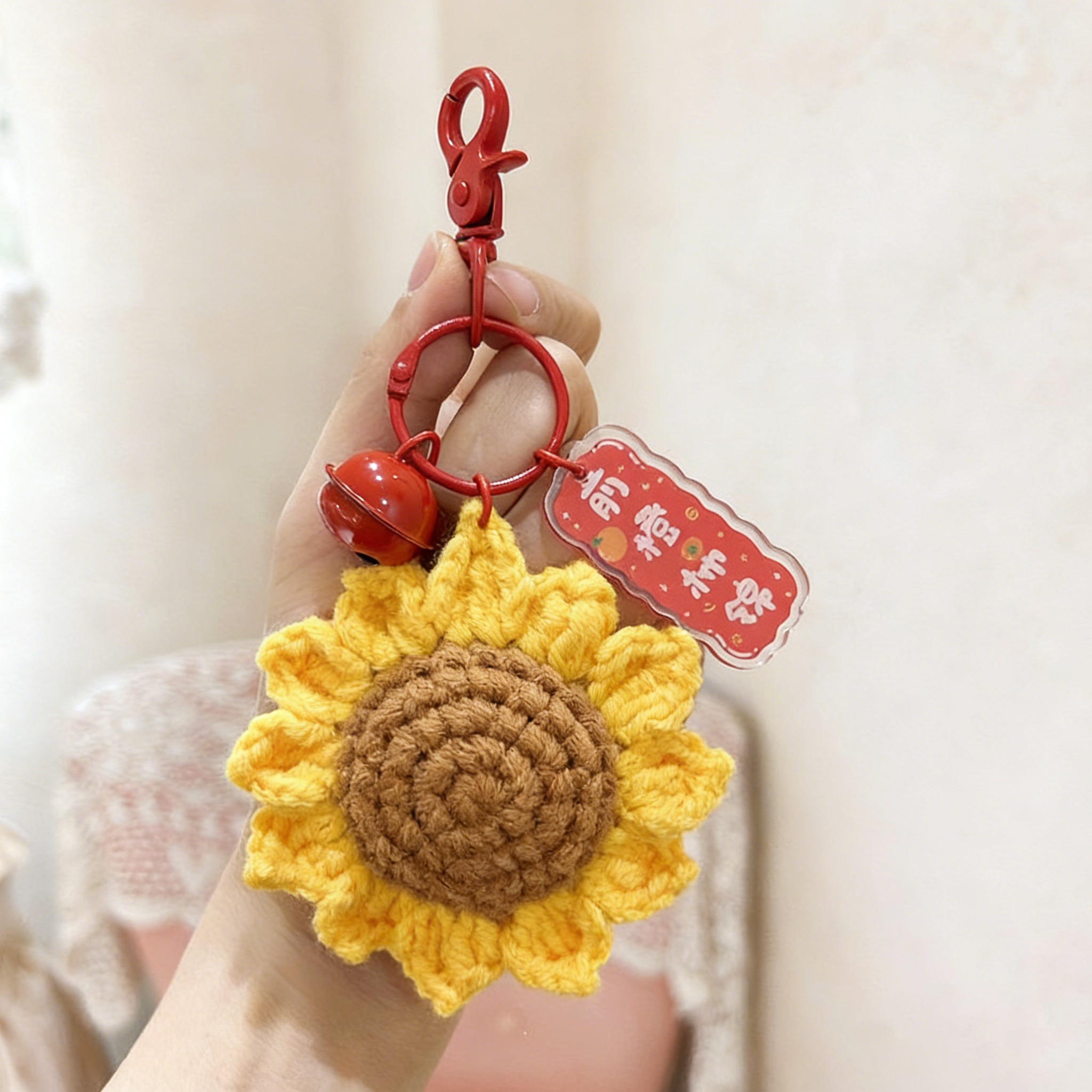 พวงกุญแจกระดิ่งดอกทานตะวัน - อนาคตสดใส