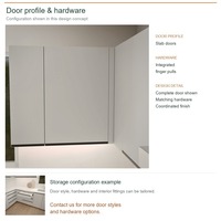 Meuble de cuisine de luxe en PVC en U avec portes en dalles grises, poignées intégrées et caissons en contreplaqué