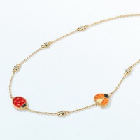 Collier tendance en laiton émaillé avec breloques en forme de coléoptères, zircon et chaîne en câble plaqué or