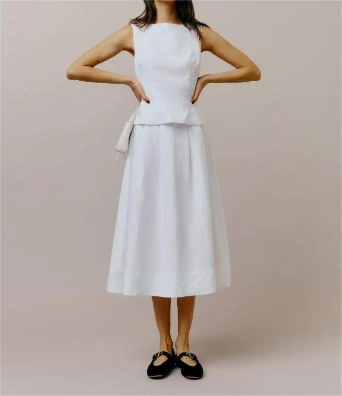シンプルなファッションホワイトノースリーブベストと膝上スカートコットンリネンスーツ婦人服ツーピーススカートセット女性