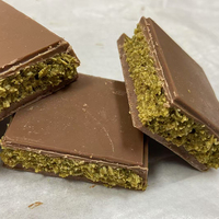 Barra de chocolate de pistacho de alta calidad a precio de fábrica, barra de chocolate de pistacho con sabor a Dubai, llena de rellenos.