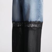 Vente en gros de streetwear pour femmes, pantalon à blocage de couleur transparent, pantalon en jean à mailles en dentelle noire délavées pour femmes