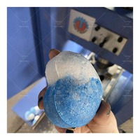 Machine de moulage pour bombes de bain moussantes hydrauliques et bombes de bain vapeur