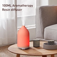 Diffuseur d'huile essentielle et petit humidificateur ultrasonique pour hôtel, produit aromatique, ODM OEM, à petit air h2o, résine pour hall d'entrée d'hôtel, 100ml