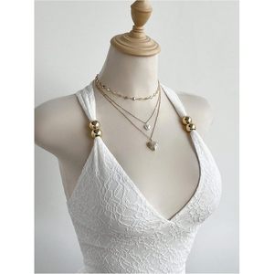 Robe mini dos nu sans manches en dentelle respirante pour femme, style licou, à volants superposés, coupe moulante, taille naturelle, idéale pour les soirées d'été - Product Image 5