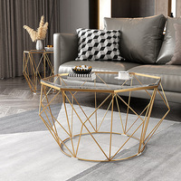 Table basse en fer forgé avec plateau en verre trempé, style nordique moderne et luxueux, cadre doré