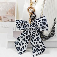 Chaîne de sac pour femme en gros, accessoire de mode avec pendentif nœud en acrylique
