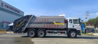 Camion poubelle compacteur Dongfeng HOWO haute capacité de 23 mètres cubes avec moteur-pompe : une efficacité inégalée pour les collecteurs de déchets urbains