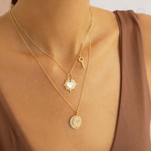 Gemnel Striking Design a Small Key Charm Hangs Alongside <strong>the</strong> Heartbeat <strong>Mother</strong> of Pearl Pendant Necklace - Product Image 2