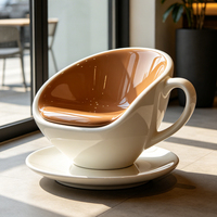 Fauteuil géant moderne en forme de tasse à café, siège créatif en forme de tasse pour les espaces d'attente publics, les salons et les espaces commerciaux