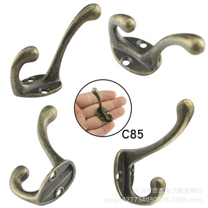 Gancho de pared de aleación de zinc C85 con acabado en bronce antiguo, doble gancho para uso en puerta o pared. - Product Image 1