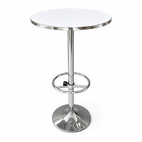 Table de bar ronde stable avec anneau repose-pieds, base large en chrome, hauteur réglable, piétement unique, support à cocktail compact