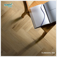 Plancher en bois à chevrons de 7mm personnalisable SPC résistant à l'usure et à l'humidité