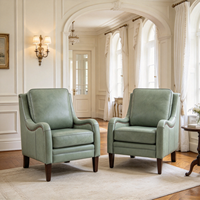 Fauteuil de salon de luxe en cuir véritable avec détails cloutés, dossier haut et accoudoirs incurvés pour la maison et le bureau