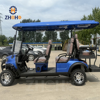 Ce chariot de golf électrique multifonctionnel 6 places est équipé d'un système audio et convient aux zones panoramiques de la plage