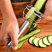 Gadgets de cuisine personnalisés Éplucheur de pommes de terre en acier inoxydable 2024 Éplucheur à julienne Éplucheur de légumes
