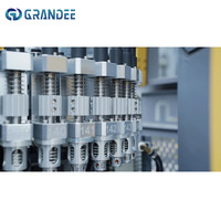 Machine de soufflage automatique de bouteilles en plastique PET, machine de fabrication de bouteilles à vitesse réglable et à pas variable