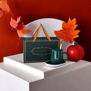 แก้วกาแฟเซรามิคพิมพ์โลโก้ตามสั่ง Sy557 พร้อมแผ่นทำความร้อนควบคุมอุณหภูมิ ของขวัญส่งเสริมการขายสำหรับกิจกรรมองค์กรและธุรกิจ - Product Image 2