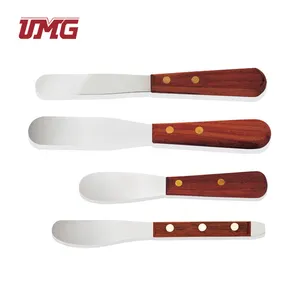 Instruments dentaires manche en bois ciment métal spatule dentaire