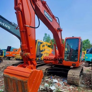 Excavatrice sur pneus hydraulique Doosan 150 d'occasion DH150W-7 DX150W-9C 15 tonnes avec moteur et composants principaux de la pompe à vendre - Product Image 1