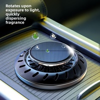 Purificateur d'air solaire rotatif en forme de soucoupe volante pour voiture, technologie silencieuse noire, compact, ne bouchant pas la vue, aromathérapie automobile, décoration de tableau de bord