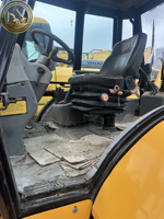 Chargeuse-pelleteuse JCB 4CX d'occasion à direction intégrale 4 roues avec moteur, boîte de vitesses, pompe et roulement - Charge nominale de 3,2 tonnes