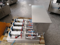 Mesin pengisi kontrol silinder piston pneumatik Semi otomatis 4 nozel untuk botol cairan kental kaleng stoples botol