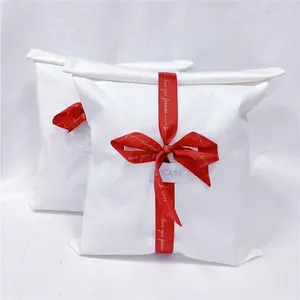 Grosir tas katun amplop kantong kemasan bantal sabuk daur ulang dengan tas hadiah amplop katun debu busur dengan Logo