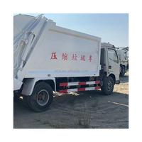 Camion compacteur d'ordures usagé avec une grande capacité et une technologie de compactage avancée pour les déchets urbains
