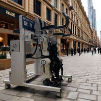 Exosquelette électrique des membres inférieurs de vente directe adapté à l'entraînement à la marche des patients paraplégiques, aide à la marche portable