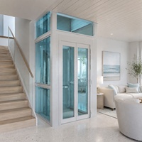 Ascenseur panoramique en verre sur mesure, homologué CE, pour villa de luxe, avec vue verticale.