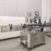 Machine de capsulage entièrement automatique pour pots de crème cosmétique et bouteilles de shampoing