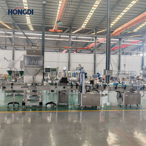 Línea de Embotellado de Gránulos Totalmente Automática con Elevador en Forma de Z, Pesadora Lineal de 4 Cabezas, Desenredador de Botellas, Tapadora y Acumulador - Product Image 6