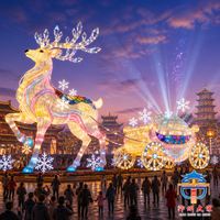 Lanterne géante artisanale en soie en forme de renne et de calèche royale avec décorations flocons de neige pour la place des festivals de Noël en extérieur
