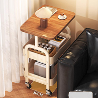 Chariot de rangement utilitaire moderne en métal à 3 niveaux, personnalisable pour la vente en gros, avec roulettes et verrouillage, servant également de table d'appoint, de chariot organisateur et de bureau mobile pour outils de salon