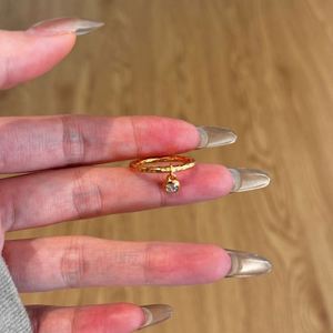 Dylam Simplicity Design Fine Charm 22K Gold Plated 925 Sterling Silver <b>Wedding</b> Band Dangle 5A <b>Cubic</b> <b>Zirconia</b> Women Jewelry <b>Rings</b> - Product Image 4