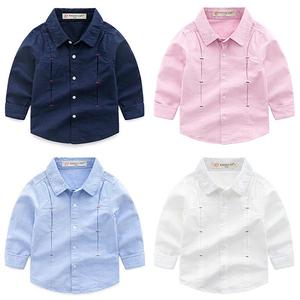 Nouveau produit : Gilet intérieur en coton noué de couleur unie pour garçons européens et américains, idéal pour les enfants - Product Image 1