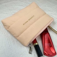 Trousse de maquillage gonflée avec logo personnalisé Trousse de toilette légère Trousse cosmétique en nylon matelassé avec fermeture éclair pour rouge à lèvres pelucheux