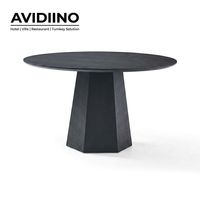 Table de salle à manger ronde sur mesure en olivier noir, piétement hexagonal, pour projets hôteliers et de restaurants, solution clé en main de qualité professionnelle pour designers