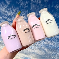 Jouet Squishy en forme de bouteille de lait, 4 couleurs, Macarons Kawaii, jouet à presser en forme de bouteille de thé au lait, cadeau pour fille avec perles
